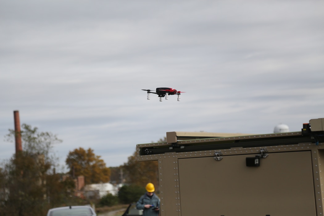 The Marine Corps Warfighting Laboratory executed a Manned and Unmanned Teaming Limited Operational Assessment (MUM-T LOA) at Muscatatuck Urban Training Center (MUTC), Indiana. The MUM-T LOA aimed to effectively combine robotics, sensors, manned/unmanned vehicles, and dismounted Marines with the goal of achieving greater mission effectiveness through enhanced situational awareness, greater lethality, improved survivability, and logistics sustainment. The event included controlled platoon and company-sized scenarios comprised of twenty-five total events, executed by Marines assigned to Echo Company, 2nd Battalion, 6th Marine Regiment.