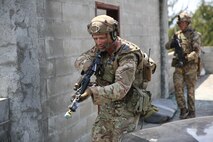 The Marine Corps Warfighting Laboratory executed Project Metropolis II ,a Dense Urban Operations limited operational experiment 2019 (DUO19) at Muscatatuck Urban Training Center (MUTC), Indiana. The event aimed to effectively combine robotics, sensors, manned/unmanned vehicles, and dismounted Marines with a focus on improving Marines' ability to sense and locate the threat, observing their speed of decision making and speed of action, and determining their lethality when employing traditional and surrogate equipment versus an enemy force in a dense urban environment. This experiment took Marines assigned to 3rd Battalion, 8th Marine Regiment, a squad-sized element from 1st Battalion, 6th Marine Regiment, and British Royal Marines assigned to 8 Troop Charlie Company, 40 Commando Royal Marines. The U.S. Marines and Royal Marine Commandos were divided into 'red' force and 'blue' force and engaged each other in a live force-on-force, free-play battle within a dense urban setting.