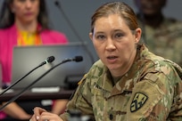 Lt. Col. Pampuch-Borden, U.S. Army Financial Management Command reserve component finance and comptroller senior advisor, gives remarks during a staff exercise at the Maj. Gen. Emmett J. Bean Federal Center in Indianapolis Oct. 31, 2024. USAFMCOM hosted the exercise to increase its operational capabilities through the four phases of the conflict continuum, reduce its inefficiencies in battle tasks, and clearly identify financial management roles, responsibilities and authorities. (U.S. Army photo by Mark R. W. Orders-Woempner)