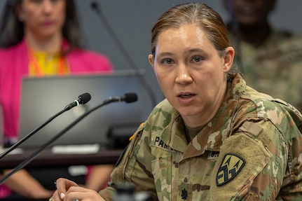 Lt. Col. Pampuch-Borden, U.S. Army Financial Management Command reserve component finance and comptroller senior advisor, gives remarks during a staff exercise at the Maj. Gen. Emmett J. Bean Federal Center in Indianapolis Oct. 31, 2024. USAFMCOM hosted the exercise to increase its operational capabilities through the four phases of the conflict continuum, reduce its inefficiencies in battle tasks, and clearly identify financial management roles, responsibilities and authorities. (U.S. Army photo by Mark R. W. Orders-Woempner)