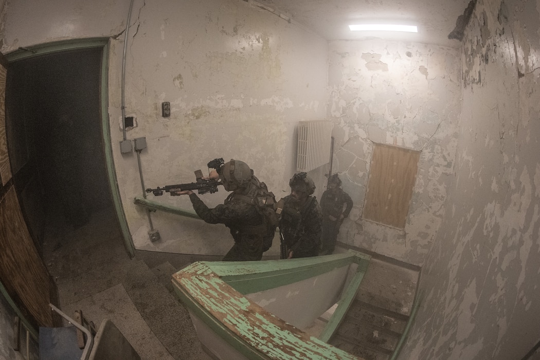 The Marine Corps Warfighting Laboratory executed Project Metropolis II ,a Dense Urban Operations limited operational experiment 2019 (DUO19) at Muscatatuck Urban Training Center (MUTC), Indiana. The event aimed to effectively combine robotics, sensors, manned/unmanned vehicles, and dismounted Marines with a focus on improving Marines' ability to sense and locate the threat, observing their speed of decision making and speed of action, and determining their lethality when employing traditional and surrogate equipment versus an enemy force in a dense urban environment. This experiment took Marines assigned to 3rd Battalion, 8th Marine Regiment, a squad-sized element from 1st Battalion, 6th Marine Regiment, and British Royal Marines assigned to 8 Troop Charlie Company, 40 Commando Royal Marines. The U.S. Marines and Royal Marine Commandos were divided into 'red' force and 'blue' force and engaged each other in a live force-on-force, free-play battle within a dense urban setting.