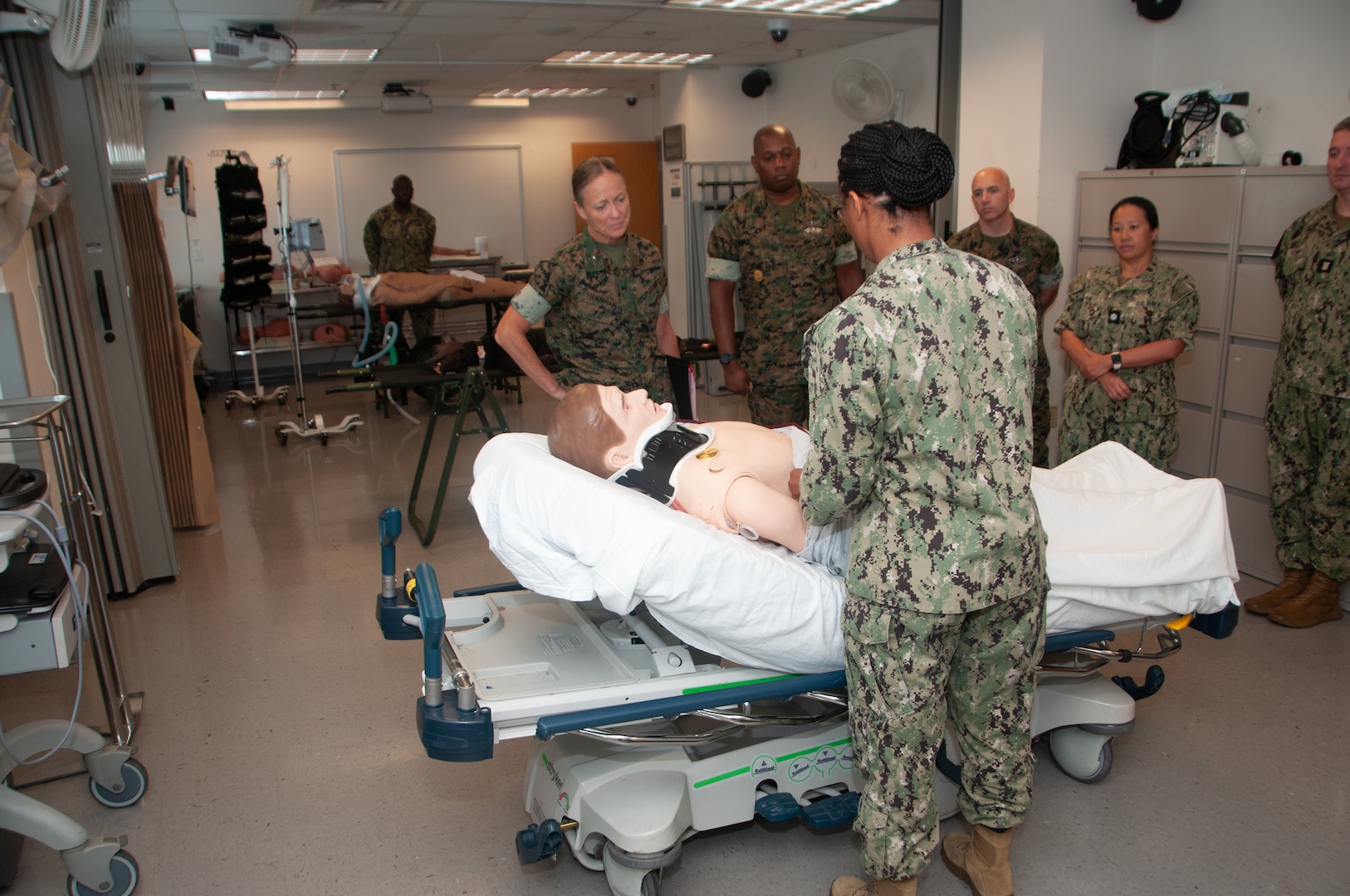 HM2 Kimaya Farrie shows Brigadier General Maura Hennigan, a state-of-the-art mannequin simulators