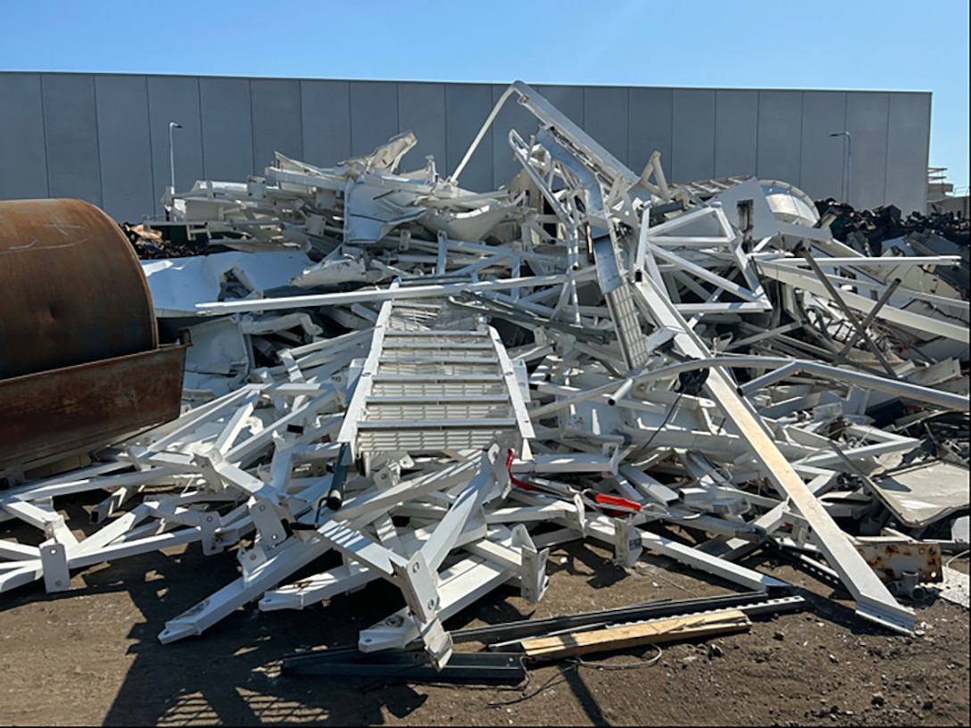 Pieces of communications equipment on a concrete pad.