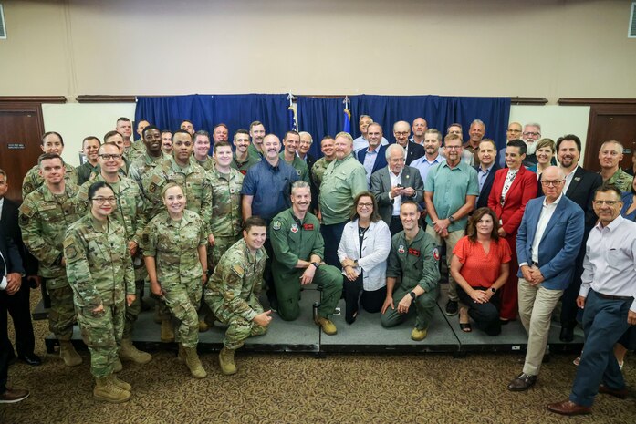 Beale Air Force Base (AFB) commanders pose for a photo with their Honorary Commander partners during the Class of 2025 Honorary Commander induction ceremony, Beale AFB, California, August 1, 2025.