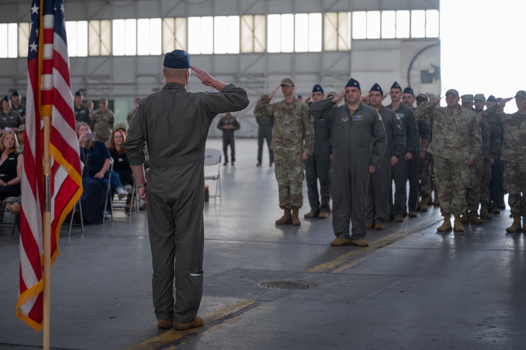 U.S. Air Force Col. Samuel Chipman, 354th Operations Group incoming commander, renders an initial salute to the formation during a change of command ceremony at Eielson Air Force Base, Alaska, Aug. 5, 2025.