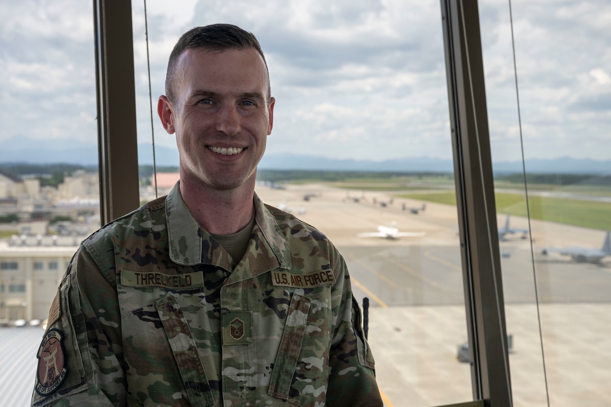 U.S. Air Force Master Sgt. Philip Threlkeld, 35th Fighter Wing air traffic control liaison, poses for a photograph during exercise Resolute Force Pacific 2025 at Misawa Air Base, Japan, July 22, 2025.
