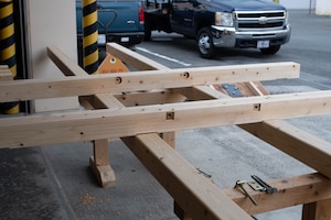 Planks of wood rest.