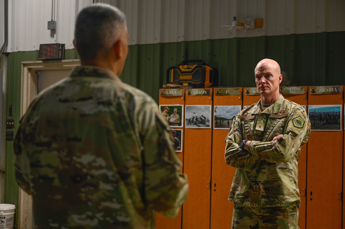 U.S. Air Force Master Sgt. Nicholas Wengerd, 19th Force Support Squadron noncommissioned officer in charge of readiness, briefs Brig. Gen. Christopher Hammond, director of the Chief of Staff of the Air Force’s Implementation Task Force, about Warrior Airman Readiness (WAR) Center operations during his visit to Little Rock Air Force Base, Arkansas, July 31, 2025. During his visit, Hammond highlighted Little Rock’s strong infrastructure and mission-ready Airmen, positioning the base at the forefront of the Air Force’s future force generation efforts.