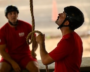 U.S. Air Force Capt. Jaren Rone, 32nd Student Squadron, Squadron Officer School, flight commander and instructor, pulls on a rope during a field exercise for Project X at Maxwell Air Force Base, Alabama, July 24, 2025.