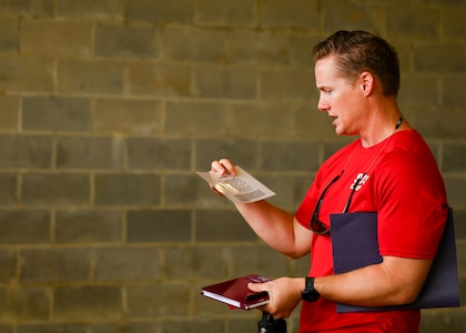 U.S. Air Force Maj. Travis Lucas, 31st Student Squadron, Squadron Officer School flight commander and instructor, reads instructions during Project X at Maxwell Air Force Base, Alabama, July 24, 2025.