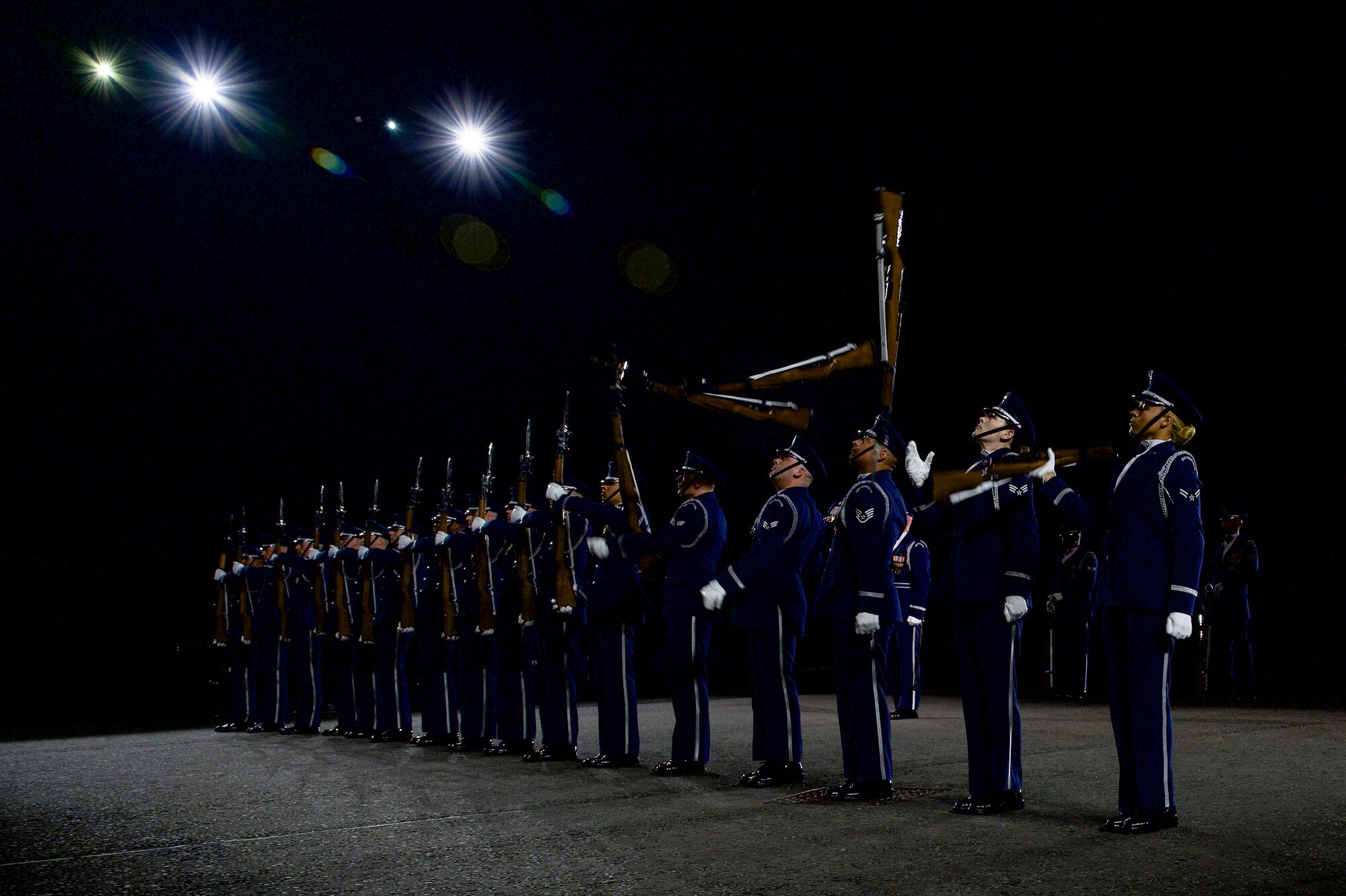 Members of the U.S. Air Force Honor Guard Drill Team conduct a line formation drill sequence during the rehearsal of the 75th Royal Edinburgh Military Tattoo in Edinburgh, Scotland, July 31, 2025.