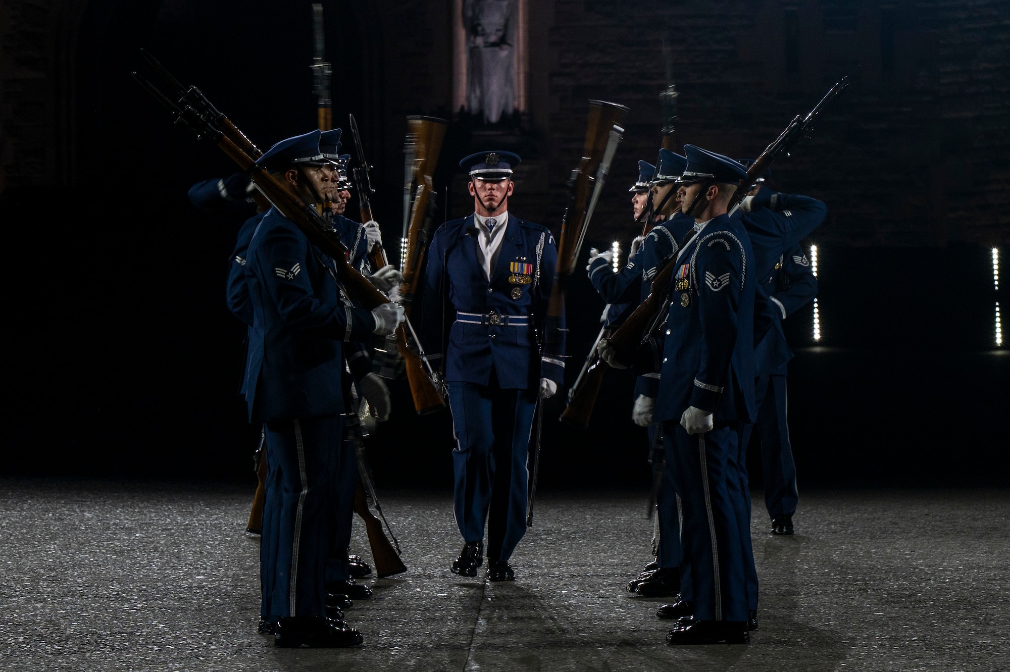U.S. Air Force Capt. Andrew Paquin, ceremonial operations officer in charge of the U.S. Air Force Honor Guard Drill team, conducts a walkthrough sequence with the Drill Team during the rehearsal of the 75th Royal Edinburgh Military Tattoo in Edinburgh, Scotland, July 31, 2025.