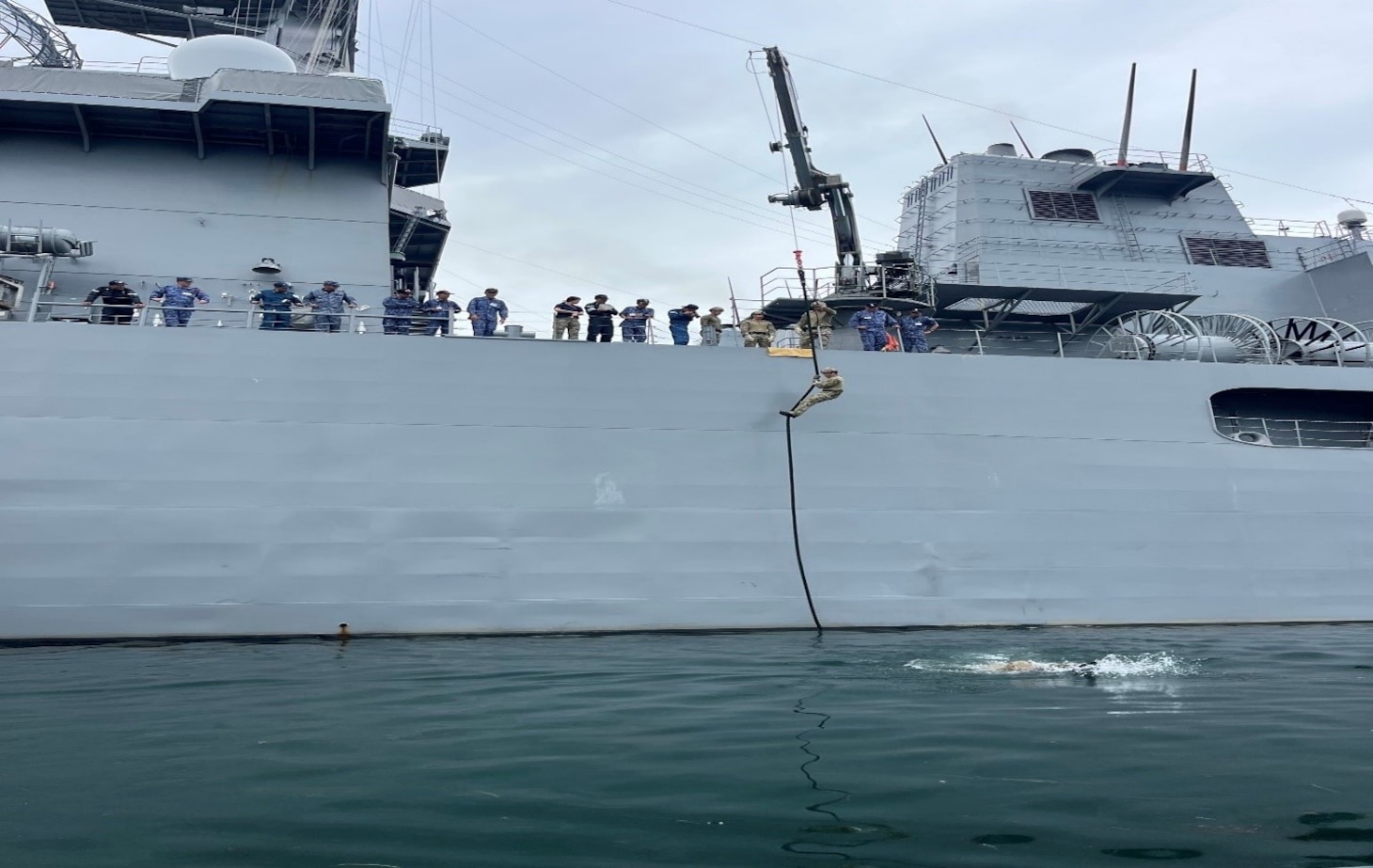 Explosive Ordnance Disposal Technician 1st Class Shane Norby conducts fast rope training aboard Uraga-class minesweeper JS Bungo (MST 464) during Mine Warfare Exercise (MINEX) 2JA near Ominato, Japan, July 15, 2025.