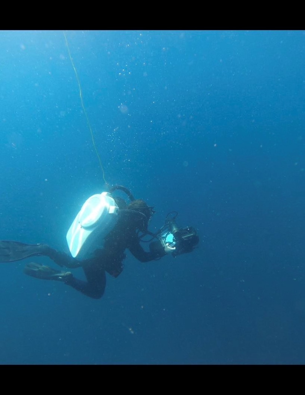 Explosive Ordnance Disposal Technician 2nd Class Mark Wagner conducts a dive utilizing the Shark Marine handheld underwater SONAR during Mine Warfare Exercise (MINEX) 2JA near Ominato, Japan, July 15, 2025.