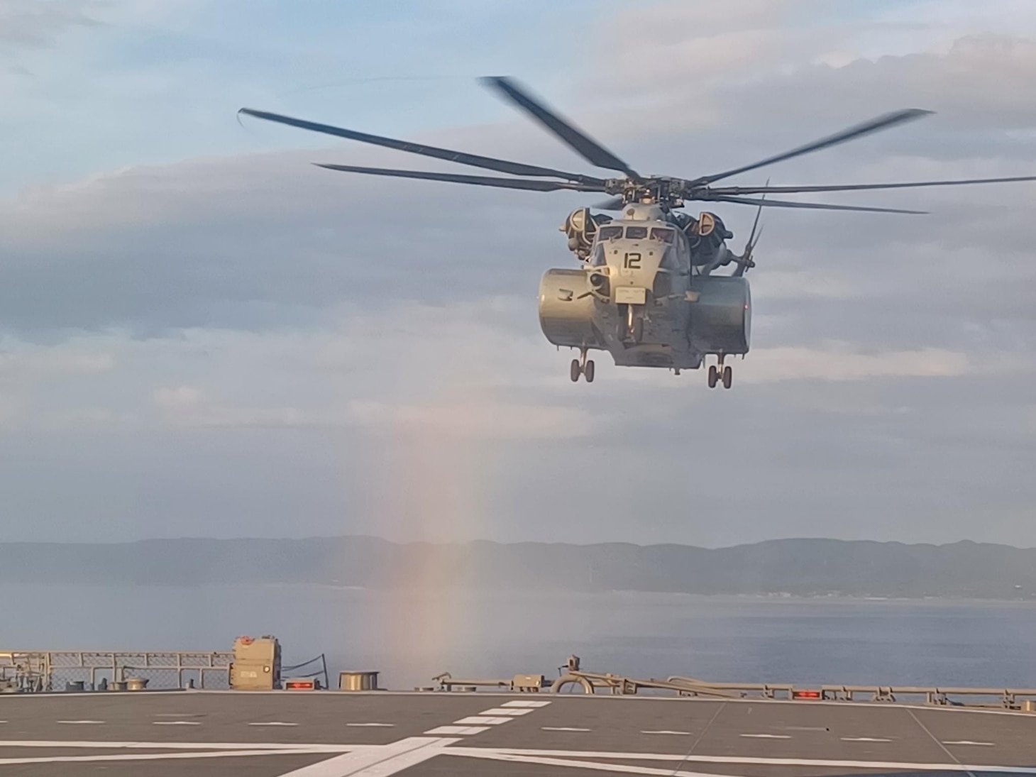 An MH-53E Sea Dragon from Helicopter Mine Countermeasures Squadron Fifteen (HM-15) Detachment 3A conducts day-time deck landing qualifications aboard the Uraga-class minesweeper JS Bungo (MST 464) during Mine Warfare Exercise (MINEX) 2JA near Ominato, Japan, July 20, 2025.