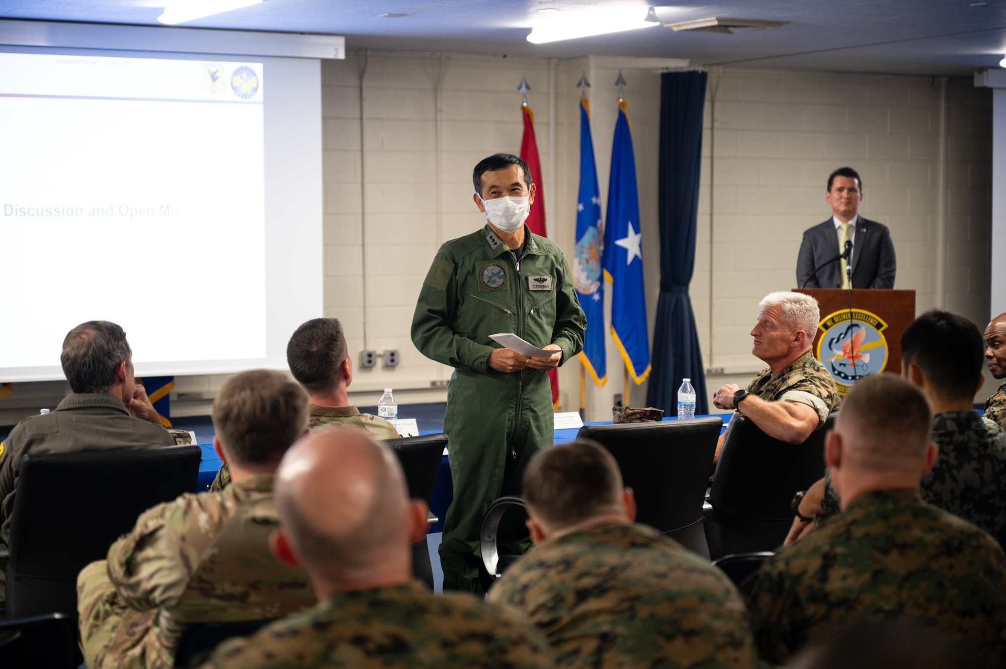 Japan Air Self Defense Lt. Gen. Takayuki Terasaki, Southwestern Air Defence commander, provides closing remarks during the Bilateral Defense of Okinawa Working Group outbrief at Kadena Air Base, Japan, August 1, 2025.