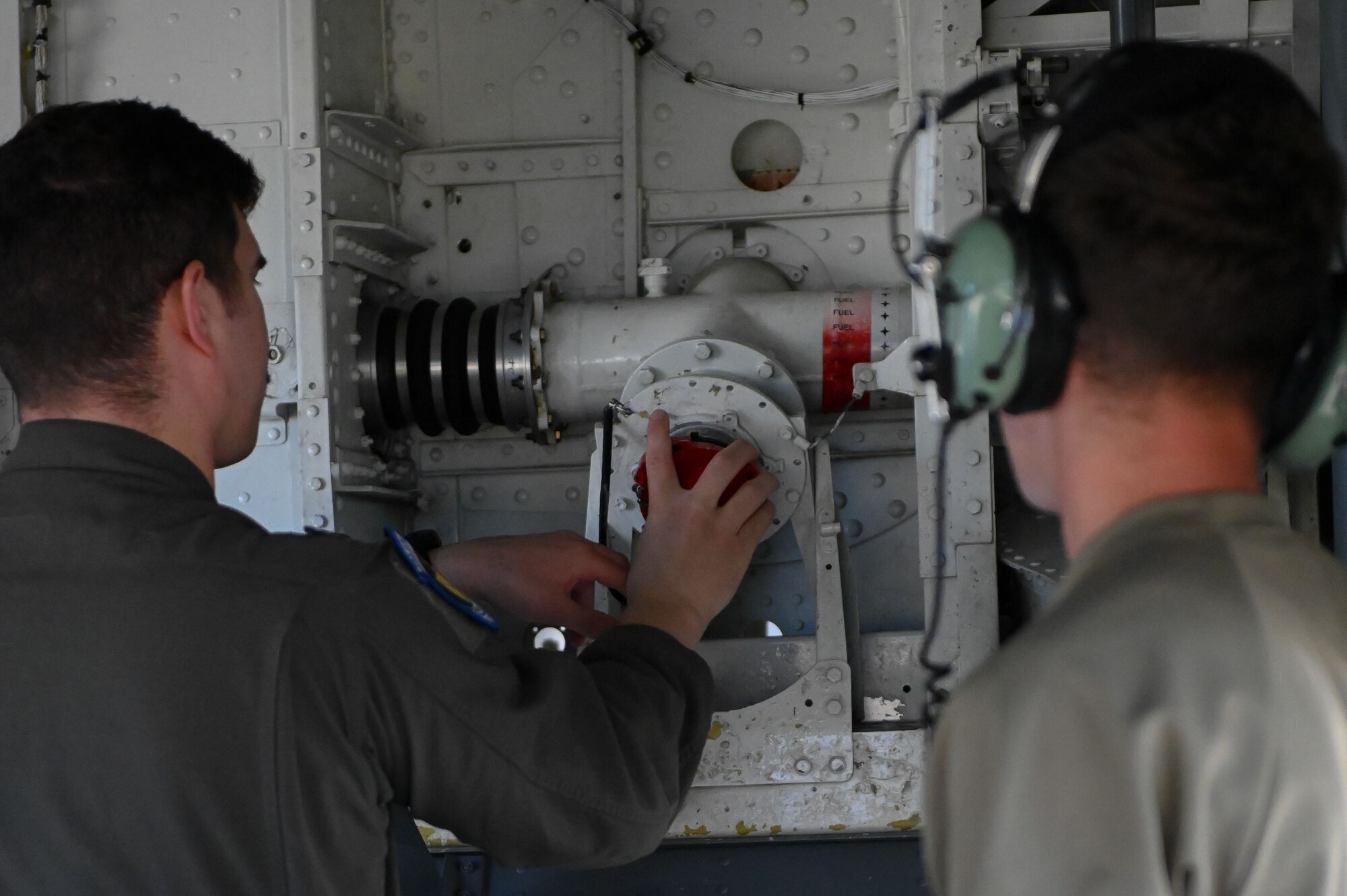 U.S. Air Force Airmen assigned to the 100th Air Refueling Wing perform pre-flight checks at RAF Mildenhall, England, July 11, 2025.