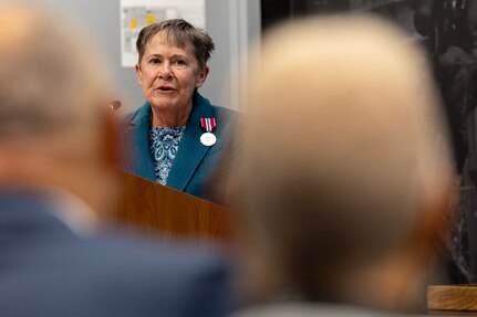 Susan Gillison, U.S. Army Financial Management Command Military Pay Operations director, delivers remarks during her retirement ceremony at the Maj. Gen. Emmett J. Bean Federal Center in Indianapolis Oct. 28, 2024. Gillison, a Mercer, Pennsylvania native, is an Army veteran whose service to the nation spans 41 years with more than 2 years in the U.S. Army Reserve, more than 21 years in the Regular Army, and more than 17 years of government civilian service with the Defense Finance and Accounting Service and USAFMCOM. (U.S. Army photo by Mark R. W. Orders-Woempner)