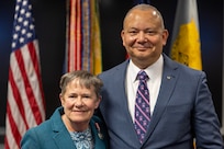 Susan Gillison, U.S. Army Financial Management Command Military Pay Operations director, poses for a photo with her husband, Aaron Gillison, during her retirement ceremony at the Maj. Gen. Emmett J. Bean Federal Center in Indianapolis Oct. 28, 2024. Gillison, a Mercer, Pennsylvania native, is an Army veteran whose service to the nation spans 41 years with more than 2 years in the U.S. Army Reserve, more than 21 years in the Regular Army, and more than 17 years of government civilian service with the Defense Finance and Accounting Service and USAFMCOM. (U.S. Army photo by Mark R. W. Orders-Woempner)