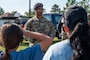 U.S. Air Force Staff Sgt. Christian Alston, 2nd Security Forces Squadron military working dog handler, explains how military working dogs are trained