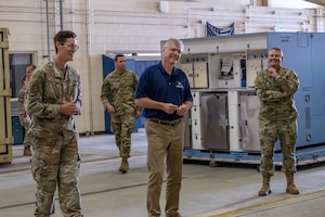 Secretary of the Air Force Troy Meink receives a tour of the Joint Mobility Complex on Joint Base Elmendorf-Richardson, Alaska.