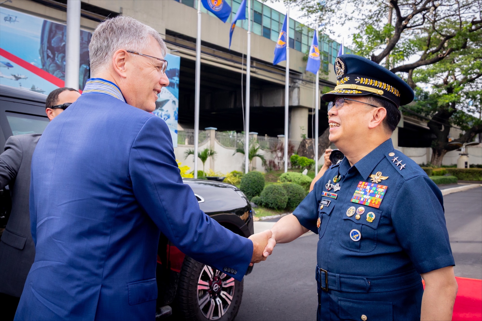 Secretary of the Air Force Troy Meink is greeted by Philippine air force Commanding General Lt. Gen. Arthur Cordura.