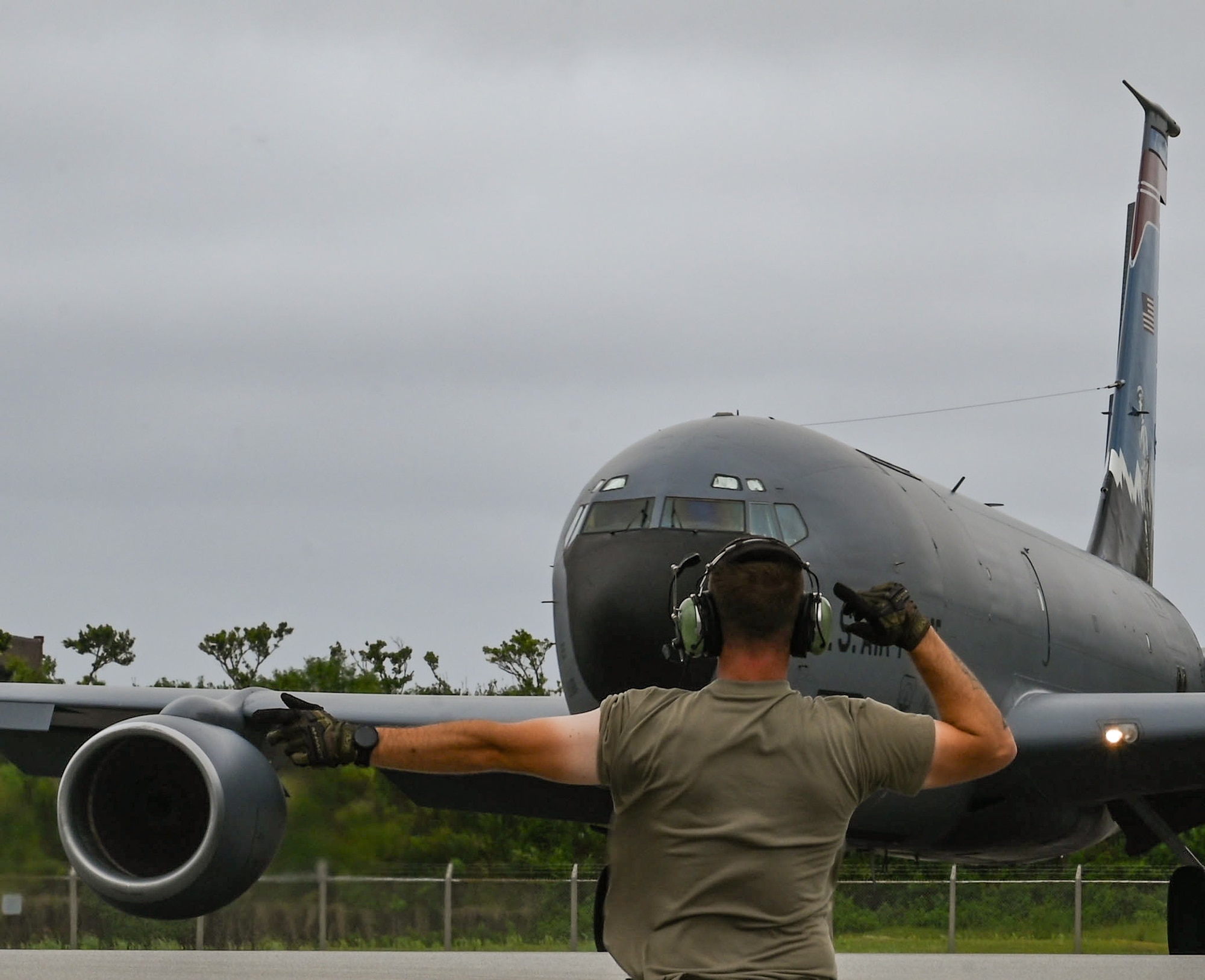 An Airman marshals a KC-135 Stratotanker from the Utah Air National Guard's 151st Air Refueling Wing during Resolute Force Pacific 25 in the Indo-Pacific region, July 24, 2025