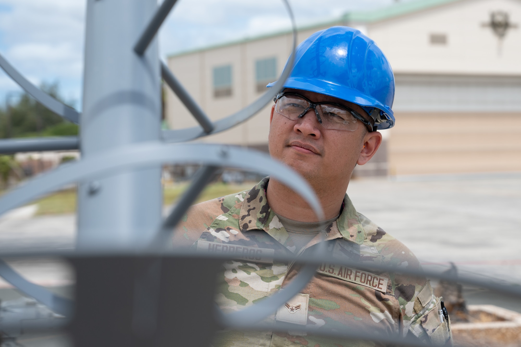 Air Force Senior Airman Mike Herreros, 109th Electromagnetic Warfare Squadron, Hawaii Air National Guard, inspects antenna equipment at Joint Base Pearl Harbor-Hickam, Hawaii, at the start of Resolute Space, July 8, 2025. Nested under the 2025 Department of the Air Force exercise series, Resolute Space 2025 demonstrates the Space Force’s preparedness for complex, large-scale military operations by exercising its ability to operate in a contested, dynamic environment against high-end threats on short notice across the service and with joint and international partners. (U.S. Space Force photo by Lt. Col. Victoria Hight)