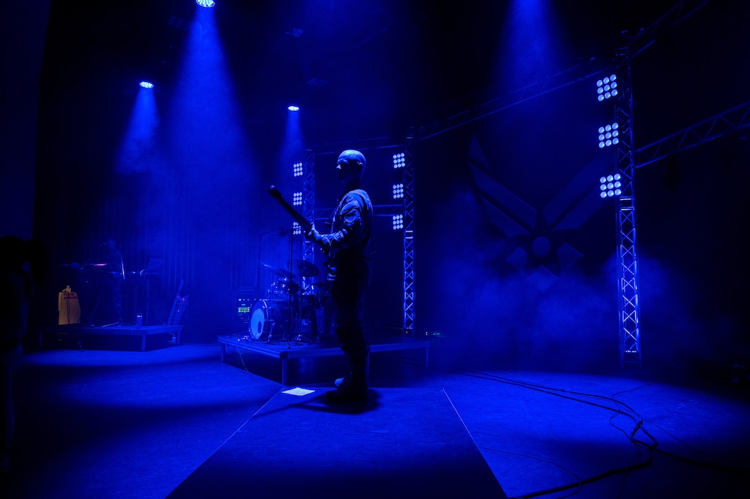U.S. Air Force Airman 1st Class Jack McDonald, Band of the West bassist, performs with his band, Top Flight.