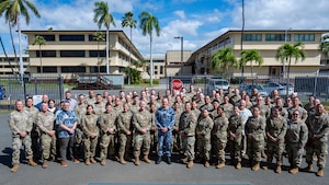 Members of the 109th Electromagnetic Warfare Squadron, Hawaii Air National Guard, pose for a group photo during Resolute Space 2025 at Joint Base Pearl Harbor-Hickam, Hawaii, July 8, 2025. Nested under the 2025 Department of the Air Force exercise series, Resolute Space 2025 demonstrates the Space Force’s preparedness for complex, large-scale military operations by exercising its ability to operate in a contested, dynamic environment against high-end threats on short notice across the service and with joint and international partners.