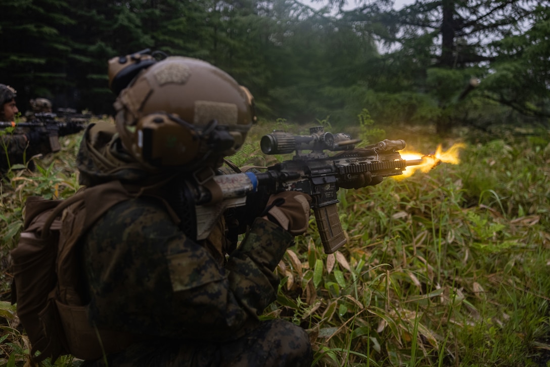 U.S. Marine Corps Lance Cpl. Eliczar Gallegos fires an M27 Infantry Automatic Rifle during a force on force in support of Artillery Relocation Training Program 25.1 at Yausubetsu Maneuver Area, Hokkaido, Japan, June 15, 2025. ARTP, established by the 1997 Special Action Committee in Okinawa, relocates live-fire artillery training from Okinawa to mainland Japan to maintain readiness and stabilize U.S. Forces’ basing, enhancing regional security across Japan and the Indo-Pacific. This training boosts the capabilities and readiness of the Marine Corps’ only permanently forward-deployed artillery unit, enabling accurate indirect fire support. Gallegos is a rifleman with 12th Littoral Combat Team, 12th Marine Littoral Regiment, 3d Marine Division. (U.S. Marine Corps photo by Cpl. Evelyn Doherty)