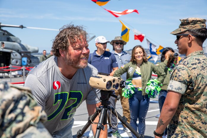 SEATTLE (July 30, 2025) – Seattle Seahawks Legend Joey Hollenbeck tours the San Antonio-class amphibious transport dock ship USS Somerset (LPD 25) during Seattle Fleet Week, June 30, 2025. Seattle Fleet Week is a time-honored celebration of the sea services and provides an opportunity for the citizens of Washington to meet Sailors, Marines and Coast Guardsmen, as well as witness firsthand the latest capabilities of today’s maritime services. (U.S. Navy Photo by Mass Communication Specialist 2nd Class John A. Miller)