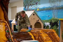 Religious Program Specialist Seaman Recruit Britton Myers cleans an indoor playground at the Seattle Ronald McDonald House during Seattle Fleet Week, July 31, 2025. Seattle Fleet Week is a time-honored celebration of the sea services and provides an opportunity for the citizens of Washington to meet Sailors, Marines and Coast Guardsmen, as well as witness firsthand the latest capabilities of today’s maritime services. (U.S. Navy photo by Mass Communication Specialist 2nd Class Evan Diaz)