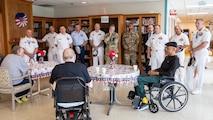 SEATTLE (July 31, 2025) – U.S. service members visit veterans at VA Puget Sound Health Care during Seattle Fleet Week, June 31, 2025. Seattle Fleet Week is a time-honored celebration of the sea services and provides an opportunity for the citizens of Washington to meet Sailors, Marines and Coast Guardsmen, as well as witness firsthand the latest capabilities of today’s maritime services. (U.S. Navy Photo by Mass Communication Specialist 2nd Class John A. Miller)