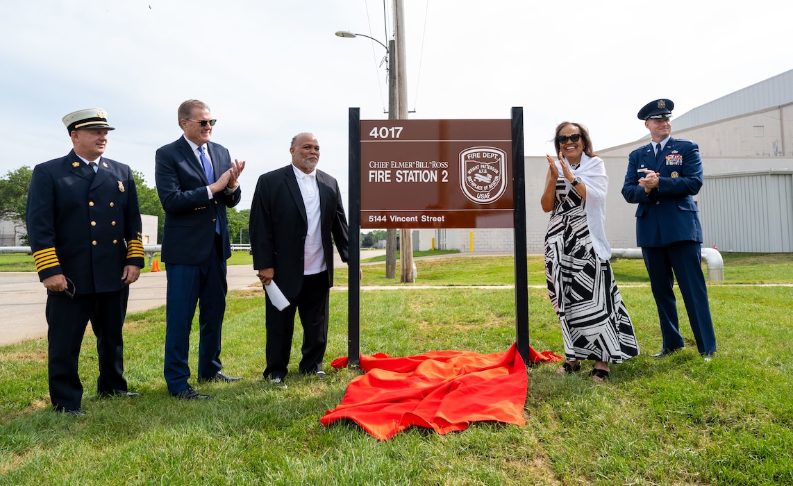 Col. Dustin Richards, commander of the 88th Air Base Wing, joined Stephan Ross Sr. and Angie Weaver on Aug. 2, 2025, to celebrate their father, Chief Elmer W. Ross, during a ceremony dedicating Fire Station 2 in his name. Chief Ross served 23 years as a civilian at Wright-Patterson AFB.