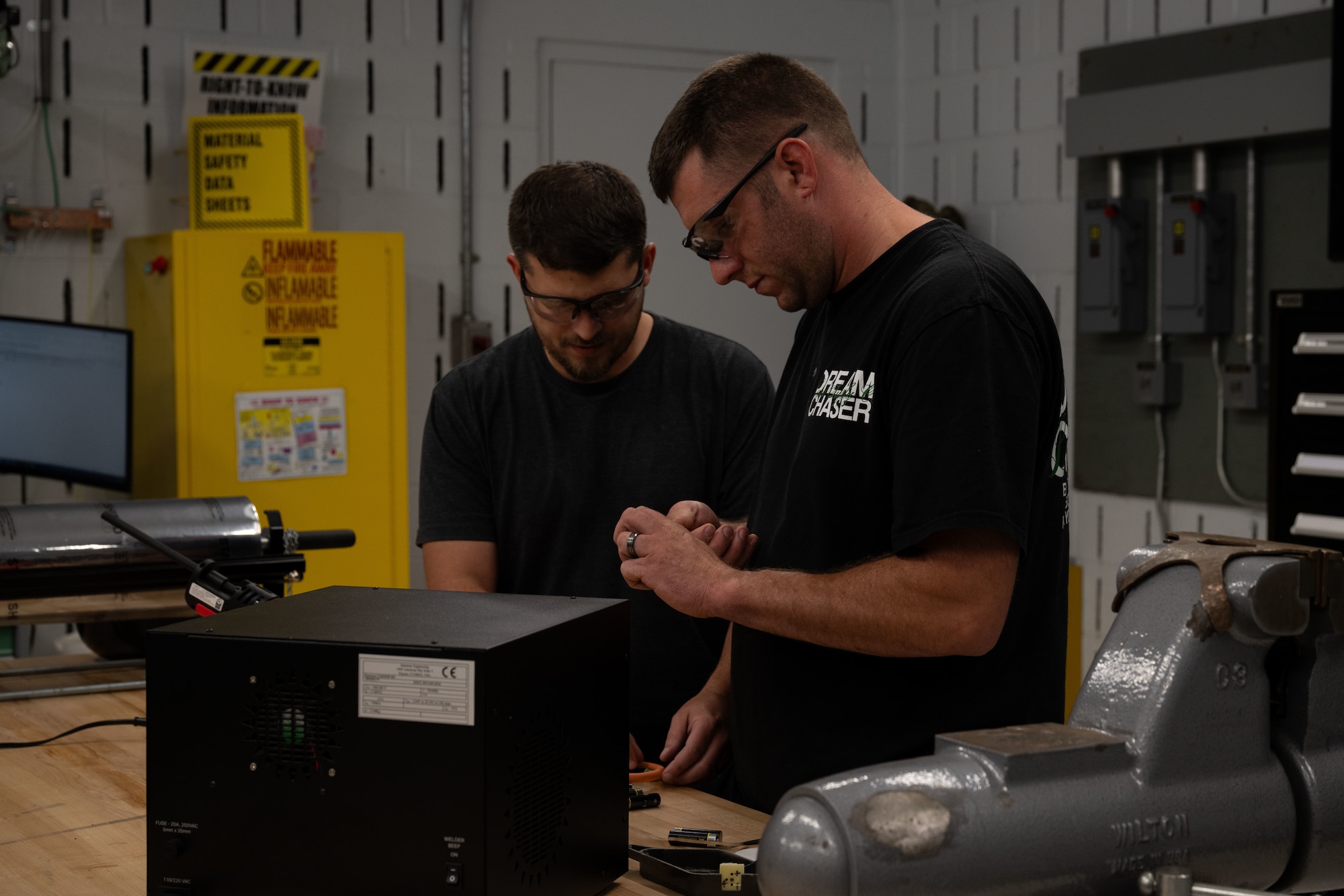 Joshua Turnbull, right, and Austin Wilt, 436th Maintenance Squadron avionics technicians, solders batteries together with nickel strips at the Air Force Repair Enhancement Program shop on Dover Air Force Base, Delaware, July 16, 2025. To repair certain parts, the AFREP team can develop new ways to fix them, such as finding ways to rebuild tools if one method is no longer produced. (U.S. Air Force photo by Airman 1st Class Liberty Matthews)
