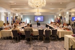 U.S. Marine Corps Sgt. Maj. Carlos Ruiz, the 20th Sergeant Major of the Marine Corps, talks to the attendees of the Marine Leaders of the Americas Conference, in Washington, D.C., Aug. 5, 2025. The 2025 Marine Leaders of the Americas Conference, hosted by the Commandant of the Marine Corps and sponsored by U.S. Marine Corps Forces, South, convenes senior Marine and naval infantry leaders from Argentina, Australia, Belize, Brazil, Canada, Chile, Colombia, Dominican Republic, Ecuador, El Salvador, France, Guatemala, Honduras, Mexico, the Netherlands, New Zealand, Panama, Paraguay, Peru, United Kingdom and the United States to discuss shared security challenges and enhance regional cooperation. (U.S. Marine Corps photo by Lance Cpl. Payton Goodrich)