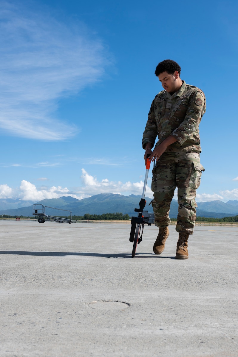 The 3rd OSS airfield operations team works around the clock to maintain a safe and efficient platform for joint force air power. (U.S. Air Force photo by Airman 1st Class Raina Dale)