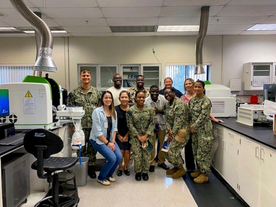 250718-O-NJ594-1203, San Diego, California, July 18, 2025 - Instructors and students of the Industrial Hygiene Techniques/Exposure Monitor Course (EMC) pose for a photo during a tour of the Certified Industrial Hygiene Laboratory within Navy Environmental Preventive Medicine Unit FIVE (NEPMU 5), in San Diego, California, July 17, 2025. The tour enhanced students’ understanding of laboratory analysis procedures, sampling media handling, environmental controls, and the role of laboratory support in occupational exposure assessments. The EMC course directly supports Navy Medicine’s commitment to improving the health and operational readiness of warfighters. (U.S. Navy courtesy photo by Chelsea Siepka)