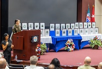 Maj. Gen. Lori Robinson speaks during the AMCOM memorial ceremony held Aug. 5 in the Bob Jones Auditorium on Redstone Arsenal, Ala. The ceremony honored 27 team members who passed away during the year.