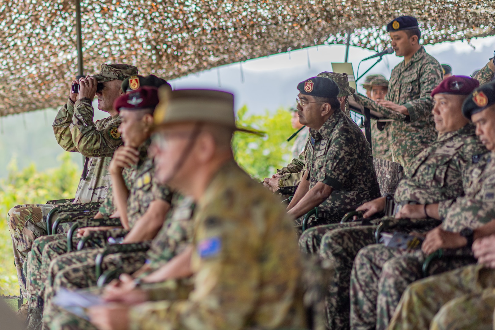 Brig. Gen. Colby Wyatt, director of joint staff for the Oklahoma National Guard, and  leaders from the United States, Malaysia and Australia observe the final attack of Exercise Keris Strike 25 in Malaysia, July 29, 2025. Exercise Keris Strike brought together military forces from the United States, Malaysia and Australia in a series of joint and combined operations, including a long-range precision live-fire utilizing a HIMARS platoon from the Oklahoma National Guard’s 45th Field Artillery Brigade. (Oklahoma National Guard photo by Sgt. Haden Tolbert)