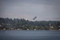The U.S. Navy Flight Demonstration Squadron, the Blue Angels, performs aerobatic formation maneuvers over Lake Washington during Seattle Fleet Week 2025 Aug. 1, 2025.  Seattle Fleet Week is a time-honored celebration of the sea services and provides an opportunity for the citizens of Washington to meet Sailors, Marines and Coast Guardsmen, as well as witness firsthand the latest capabilities of today’s maritime services. (U.S. Navy photo by Mass Communication Specialist 1st Shane Bryan/Released)