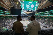 SEATTLE (Aug. 1, 2025) – A Sailor and Marine attend a Seattle Storm game at Climate Pledge Arena during Seattle Fleet Week, Aug. 1, 2025. Seattle Fleet Week is a time-honored celebration of the sea services and provides an opportunity for the citizens of Washington to meet Sailors, Marines and Coast Guardsmen, as well as witness firsthand the latest capabilities of today’s maritime services. (U.S. Navy Photo by Mass Communication Specialist 2nd Class John A. Miller)