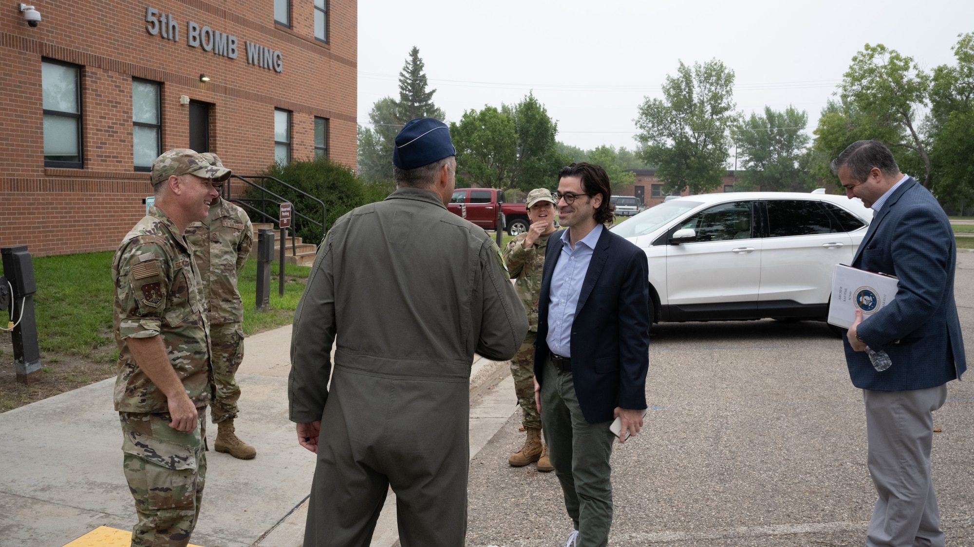 Base leadership greets the Congressional Staff Delegation (STAFFDEL) as they arrive at Minot Air Force Base, North Dakota, Aug. 5, 2025. A STAFFDEL is a group of staff members from a committee or personal office of a member of Congress.