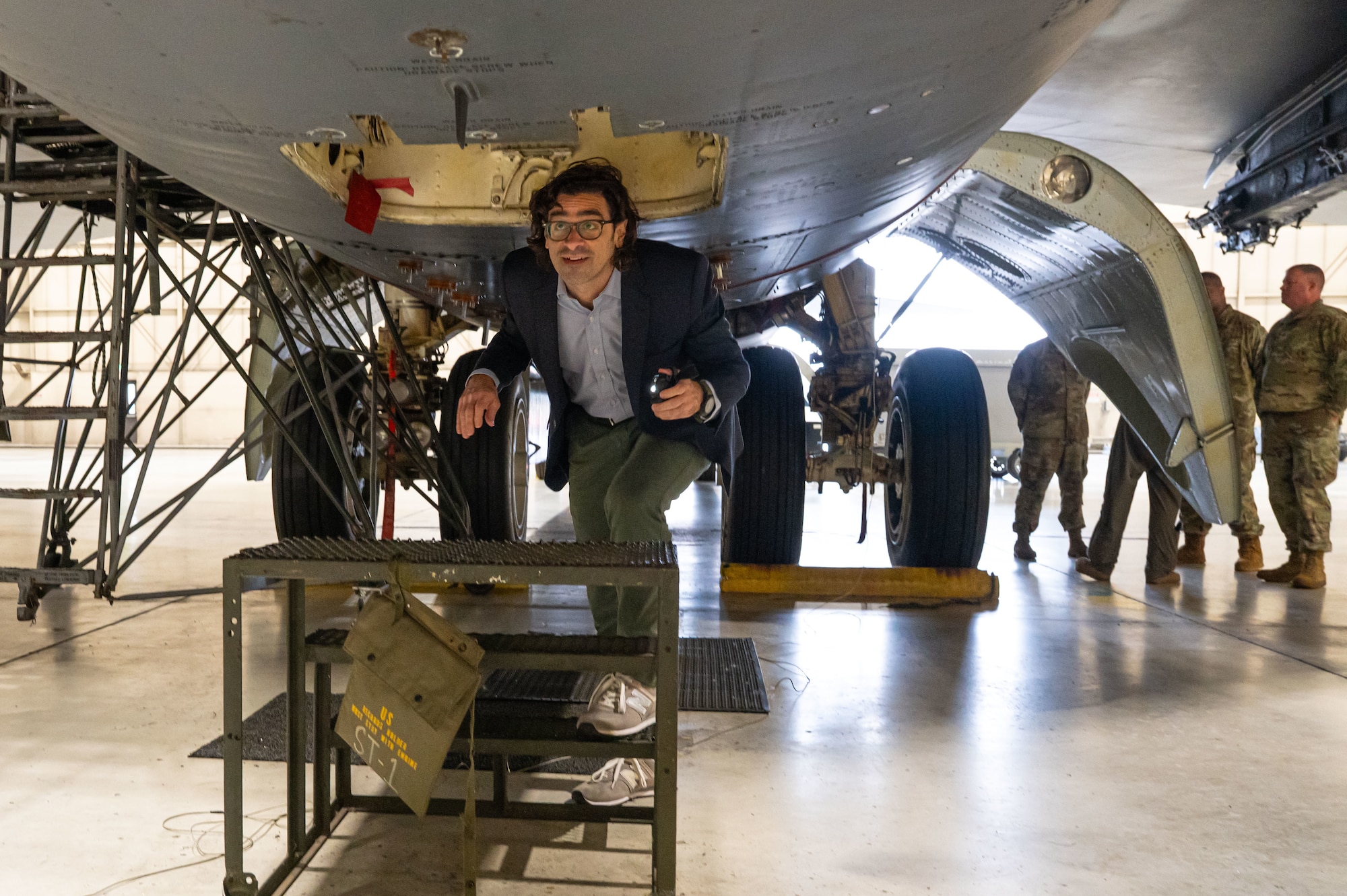 Robert Karem, congressional staff delegate, enters a B-52H Stratofortress during a static tour at Minot Air Force Base, North Dakota, Aug. 5, 2025. Karem was given an extensive tour of the base and learned about the mission it serves.
