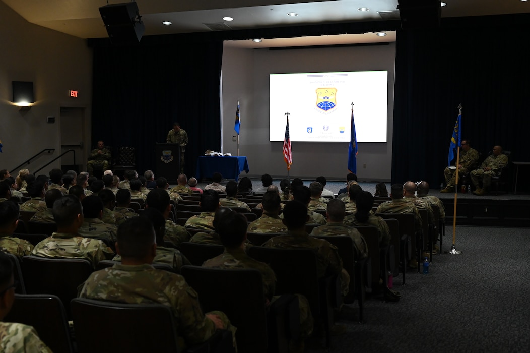 Airmen from the 433rd Airlift Wing listen to opening remarks during an assumption of command ceremony at Joint Base San Antonio-Lackland, Texas, Aug. 2, 2025.