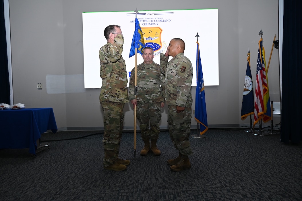 Col. Douglas C. Jeffrey IV, 433rd Airlift Wing commander, and Col. Michael H. M. Egbalic, incoming 433rd Maintenance Group commander, exchanges salutes during an assumption of command ceremony at Joint Base San Antonio-Lackland, Texas, Aug. 2, 2025.