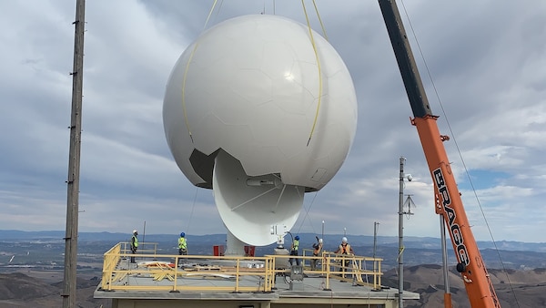 People install an antenna