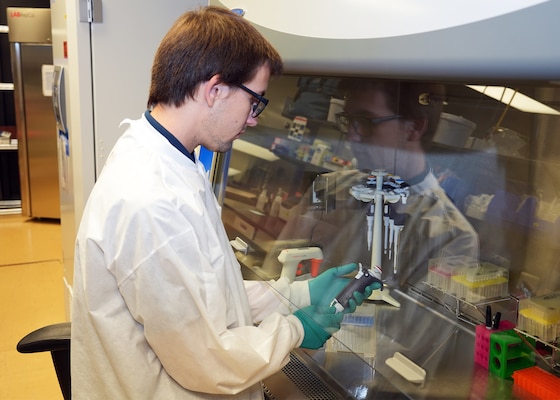 JOINT BASE SAN ANTONIO – (July 28, 2025) – Seth Day, of Rusk, Texas, a senior attending the University of Texas at San Antonio, performs cell culture work in the Directed Energy Health Effects Laboratory within the Tri-Service Research Laboratory. Day is currently assigned as an intern with Naval Medical Research Unit (NAMRU) San Antonio through the Oak Ridge Institute for Science and Education (ORISE). ORISE is a U.S. Department of Energy asset that is dedicated to enabling critical scientific, research, and health initiatives of the department and its laboratory system by providing world class expertise in STEM workforce development, scientific and technical reviews, and the evaluation of radiation exposure and environmental contamination. Navy Medicine Research & Development (NMR&D) makes use of multiple channels to recruit and retain critical U.S. Navy medical support personnel. The research commands reach out to the next generation of scientists through conferences, STEM events, internships and career days, and support recruiting efforts early in undergraduate and graduate programs. NAMRU San Antonio, part of NMR&D, conducts gap-driven combat casualty care, craniofacial, and directed energy research in support of Navy, Marine Corps and joint U.S. warfighter health readiness and lethality while engaged in routine and expeditionary operations. (U.S. Navy photo by Burrell Parmer, NAMRU San Antonio Public Affairs/Released)