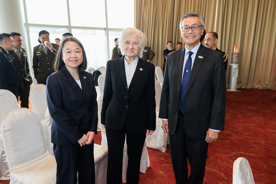 Lisa S. Liao, U.S. Embassy Chargé d’Affaires, Naval Postgraduate School (NPS) President retired U.S. Navy Vice Adm. Ann E. Rondeau, Ed.D., and National University of Singapore (NUS) President Professor Tan Eng Chye celebrate the announcement of a new joint degree program, July 23.